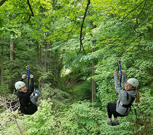 2 girls on the Wild Rouge zipline